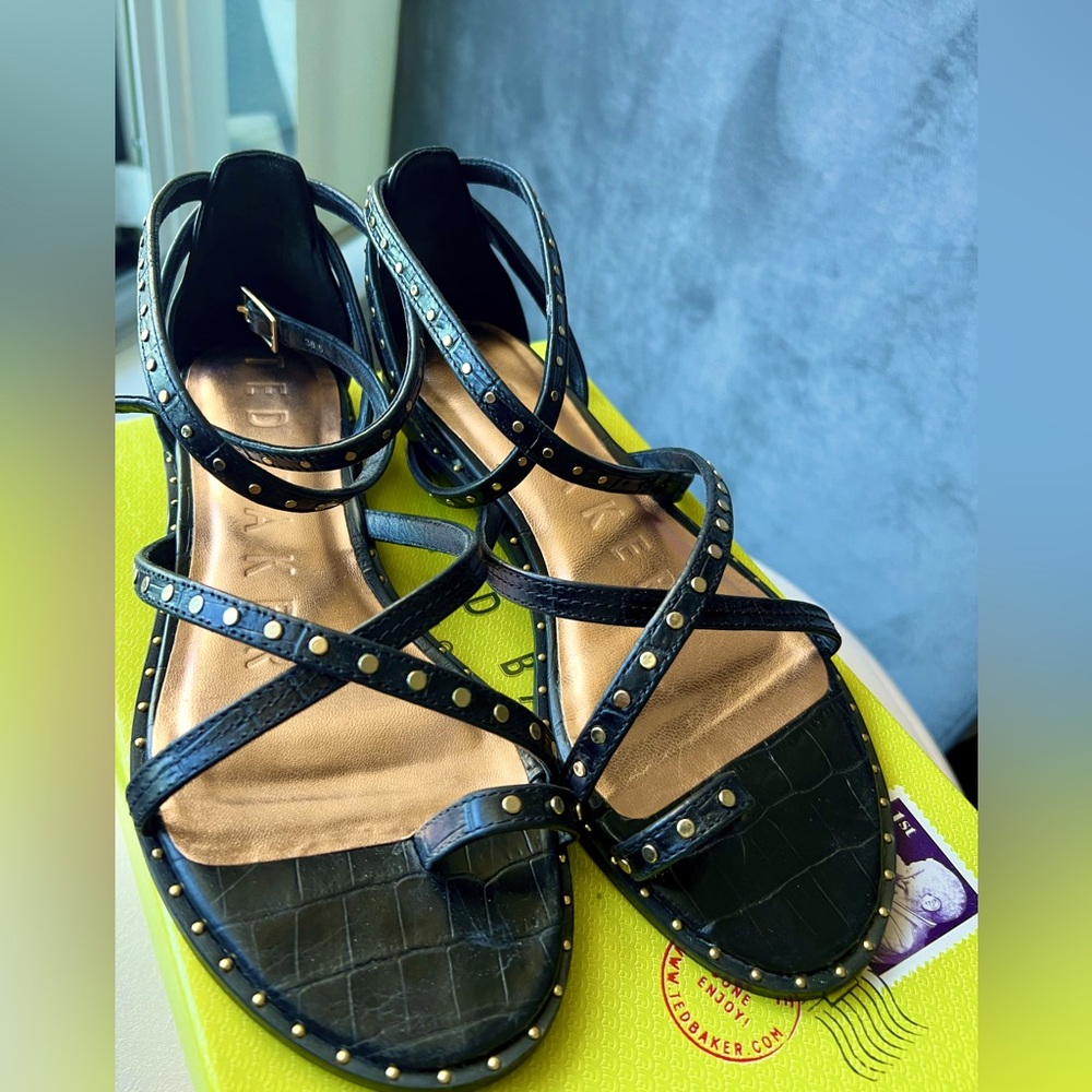 Ted Baker black leather gold studded gladiator sandal.